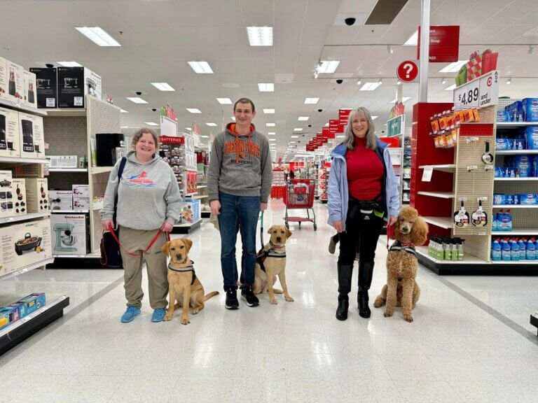 Oregon Puppy raisers training at Target shopping center.