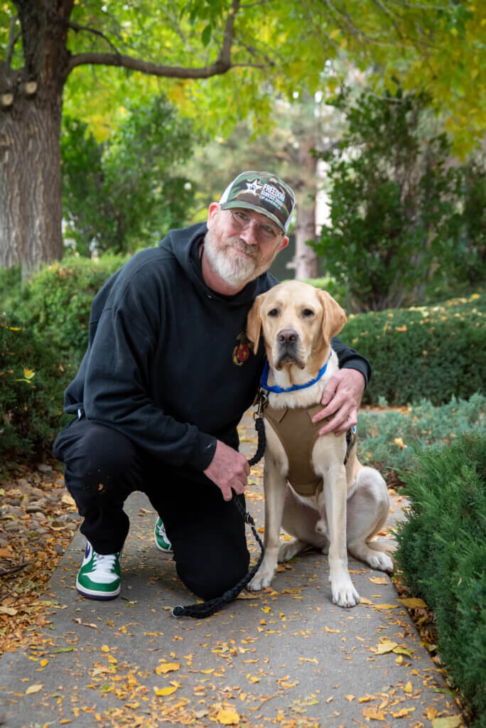 U.S. Marine Corps veteran with Freedom Service Dog Scooby.