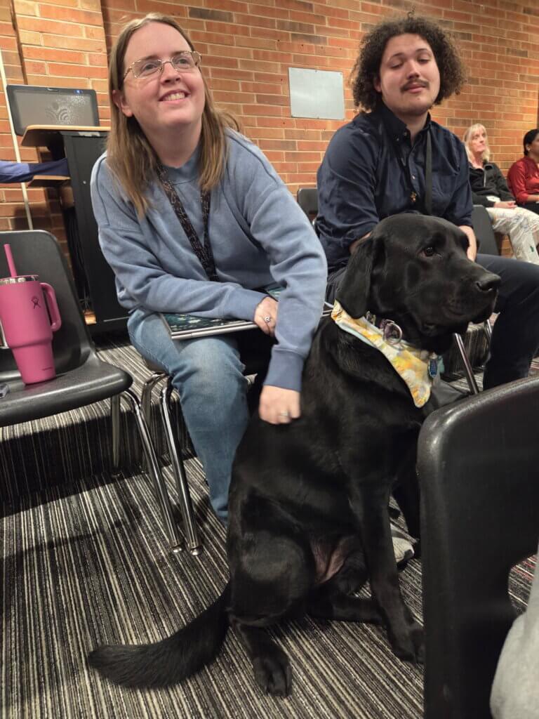 Facility dog with students.