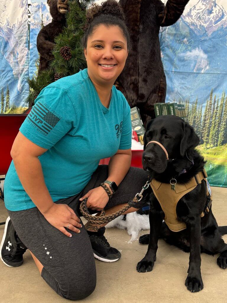 Former first responder Janelle and service dog Huxley.